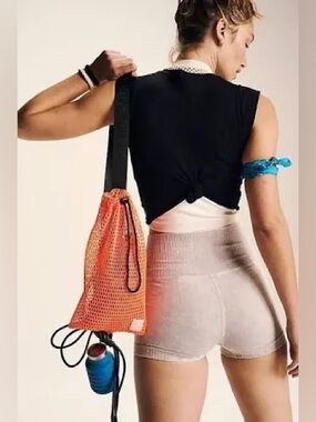 Free People Movement by Free People Mini Mesh Sling Bag in neon orange